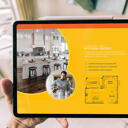 Tablet showing Shea3D Kitchen-Centric floor plan page with white kitchen photo, chef, and layout diagram