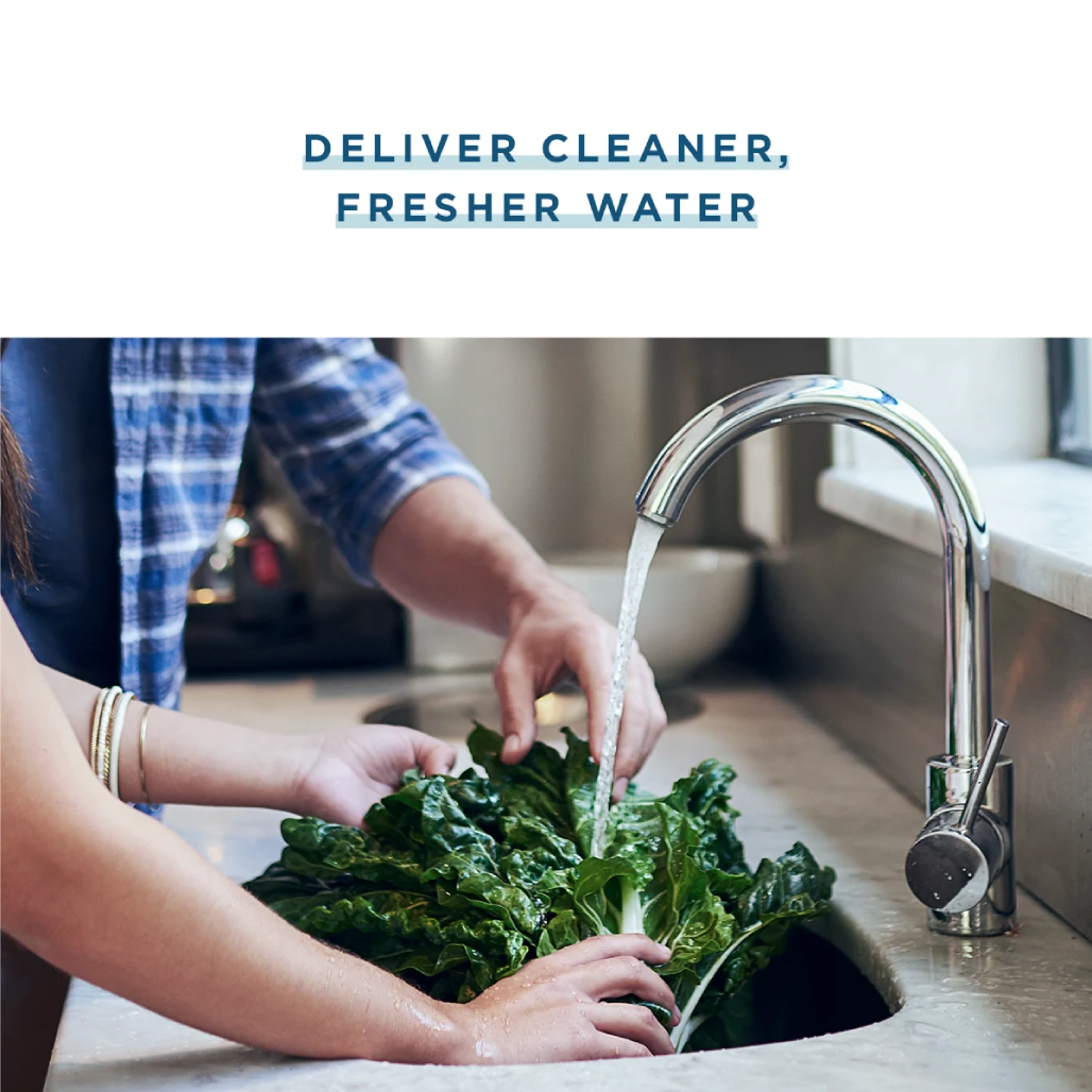 Pure Living by Shea Homes graphic reading "Deliver Cleaner, Fresher Water" with hands rinsing greens at a kitchen sink