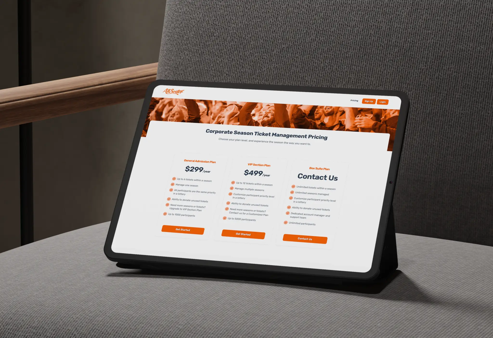 Tablet on a chair displaying AllSeater's Corporate Season Ticket Management pricing page