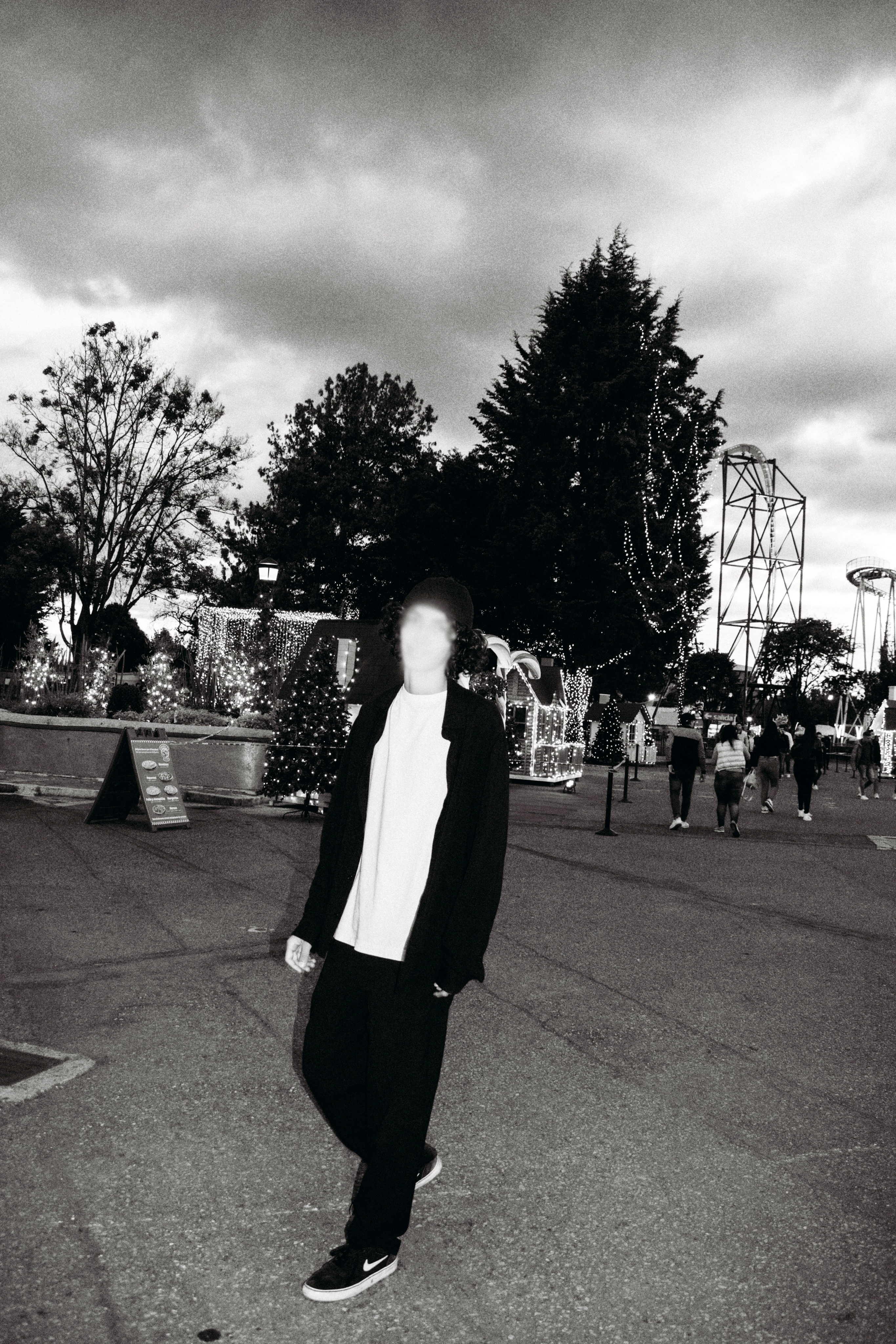 black and white photo of the photographer’s full body