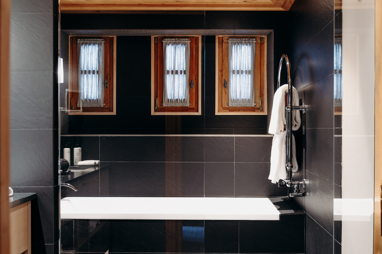 Spectacular mountain views from a 5-star hotel in Megève, offering a luxurious alpine stay