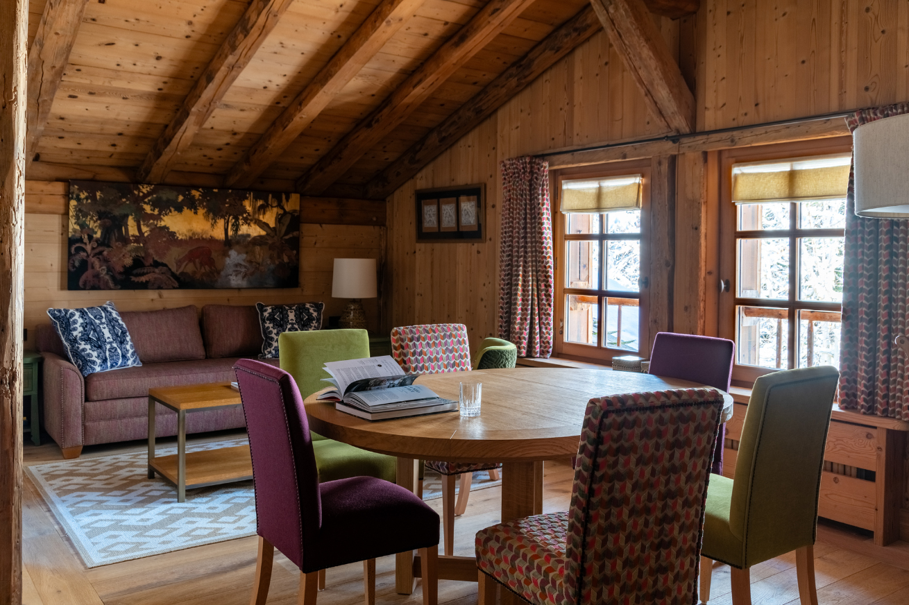 Cosy living room and spacious bed in a luxury chalet in Megève, ideal for a soothing mountain break