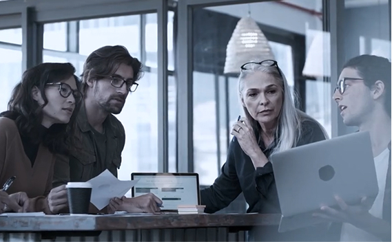 A CEO discussing on a group of leaders