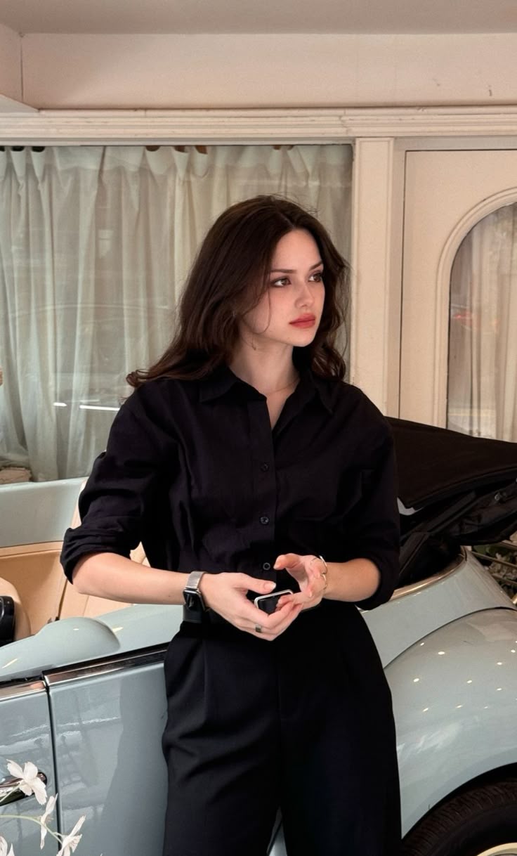 girl standing in black 