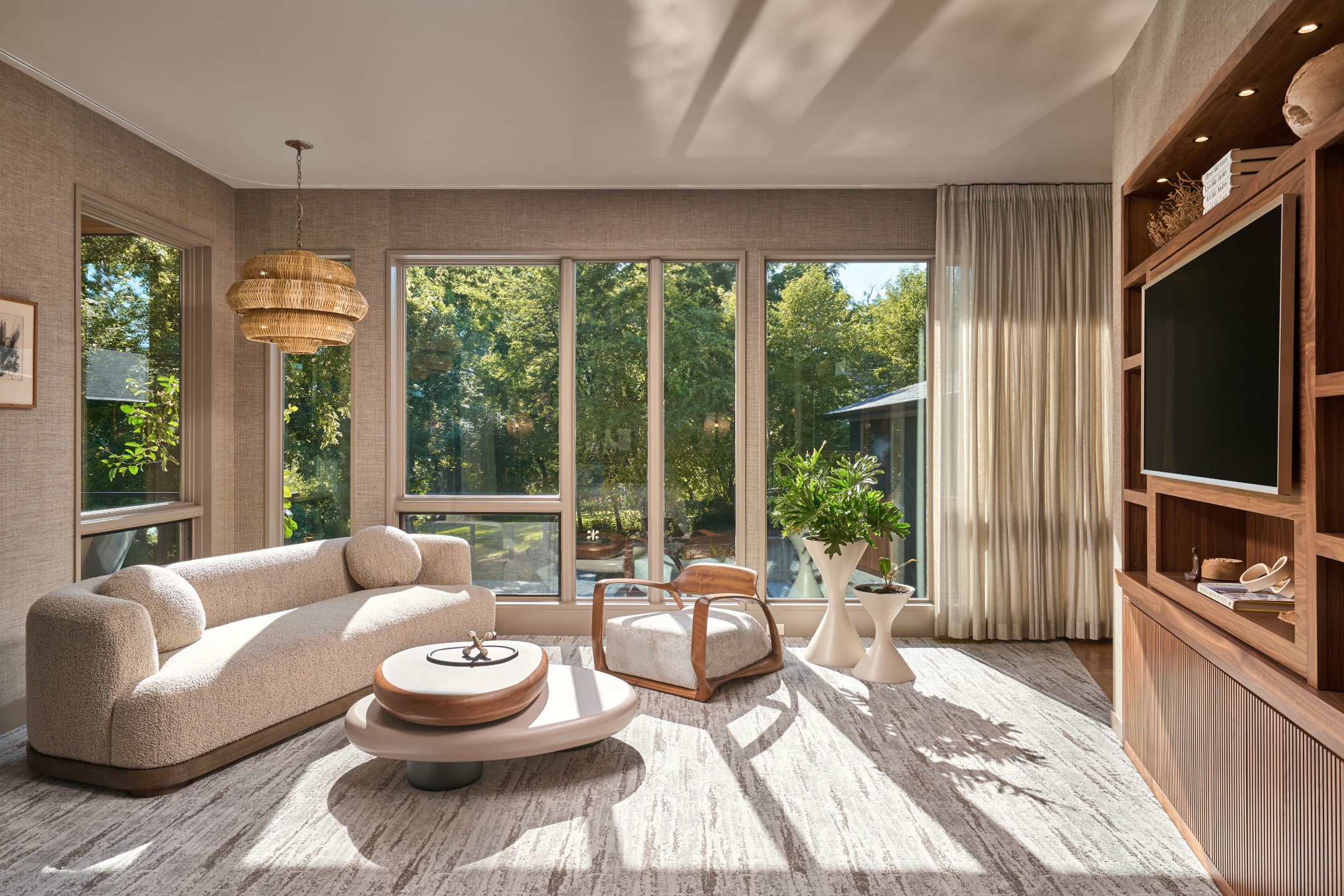 A Model 2 chair designed and built by Vlad Krasnogorov in a living room. Builder: Revolution Design + Build. Photography: Drew Gray