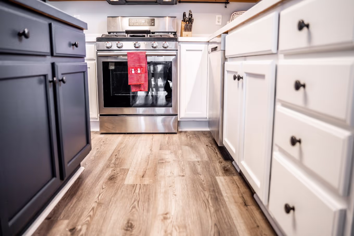 kitchen with white and black cabinets