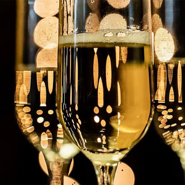 Sparkling wine served in fine glassware