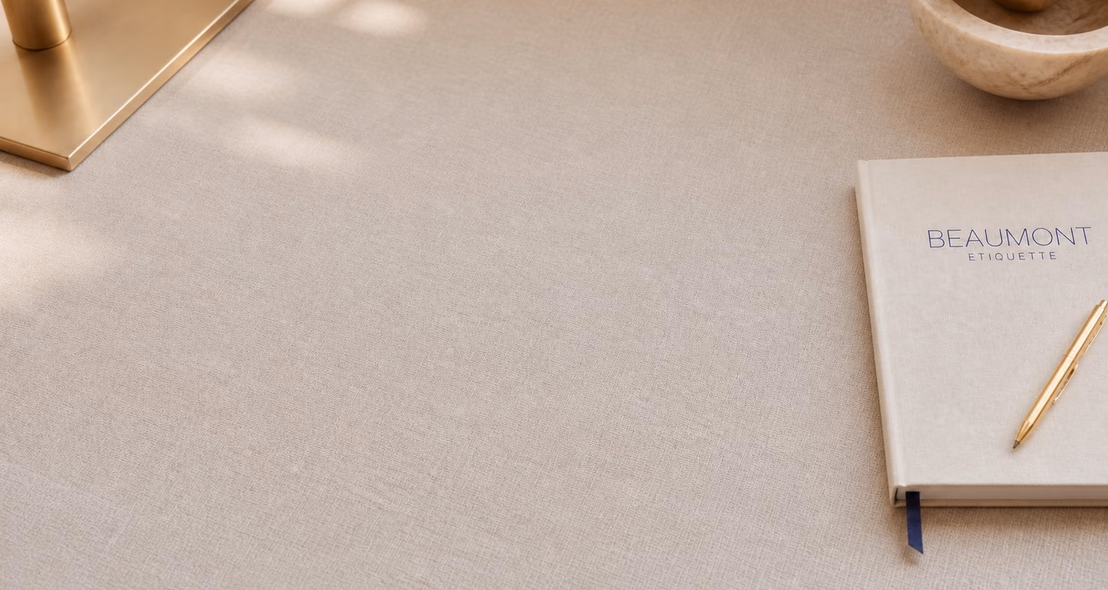 An elegant Beaumont Etiquette notebook arranged for a professional training experience