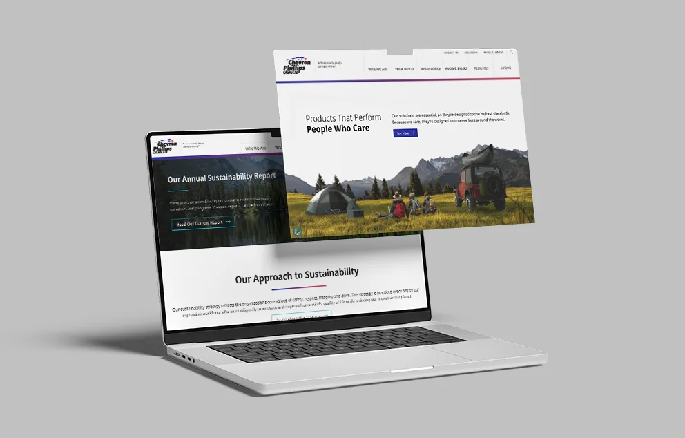 Laptop with a sustainability report on its screen, as well as the Chemicals landing page popped off the display