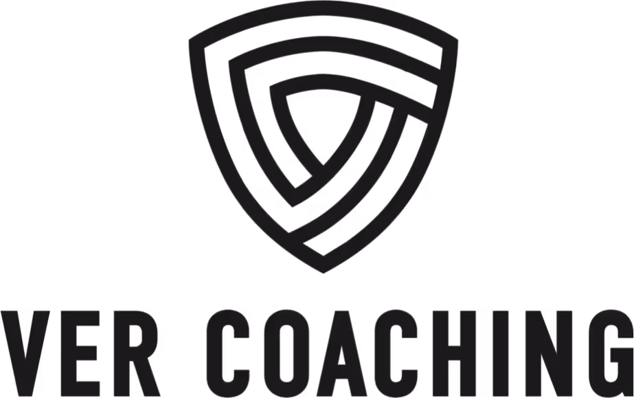 Black abstract shield logo above the text 'VER COACHING'.