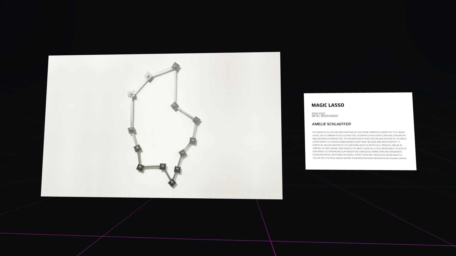 MUD Foundation XR Verse Magic Lasso, featuring a minimalist digital installation with a white abstract lasso-like structure made of connected metal segments and an exhibition panel identifying the artwork by Amelie Schlaeffer.