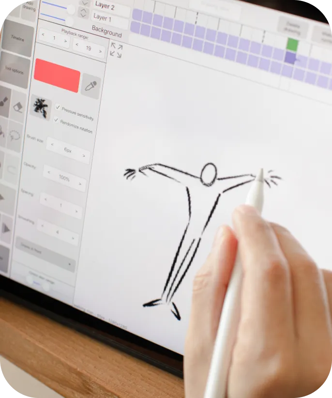 Person drawing a simple human figure on a tablet with a digital pen, using an animation or illustration software.