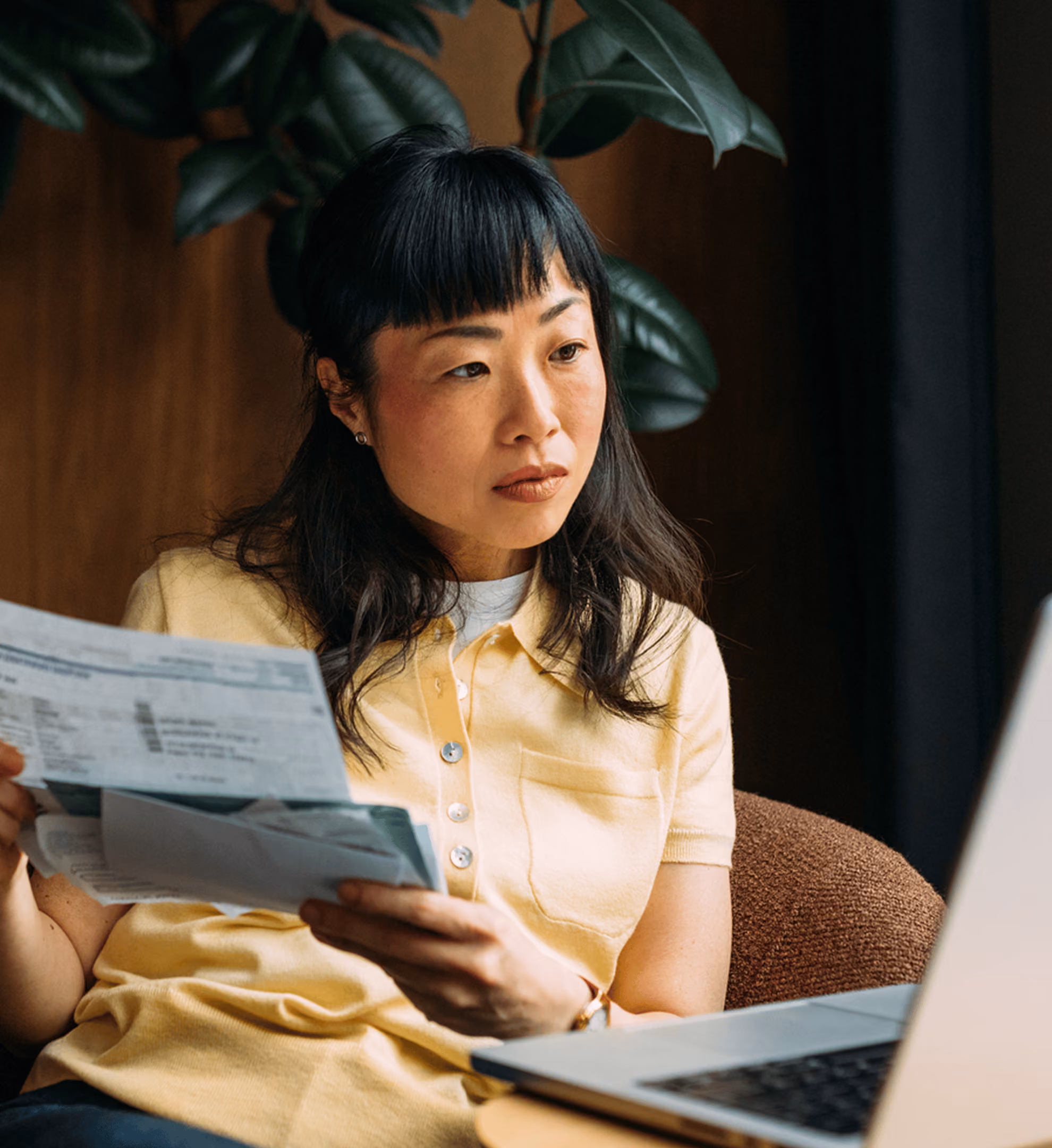 A practice staff member on a phone call at their desk
