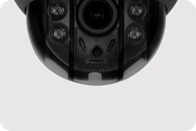 A black camera with a white lens.