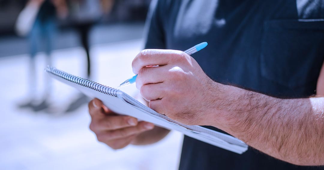 EV charger installer with a checklist of installation procedures