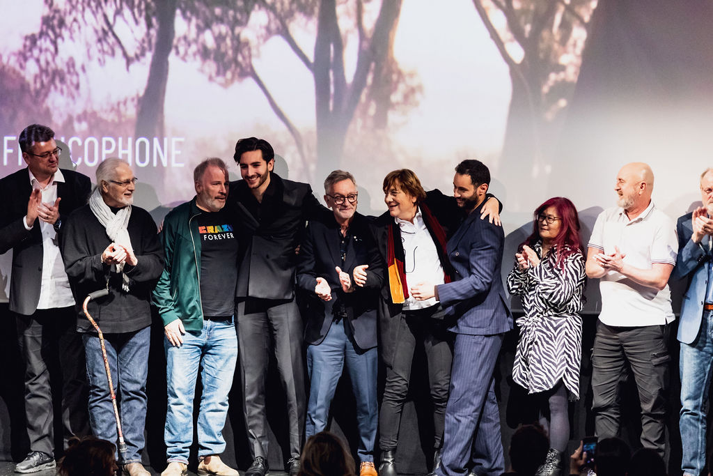 Aron Archer and the team of On Sera Heureux on stage at the film premiere and Cinemania festival opening gala