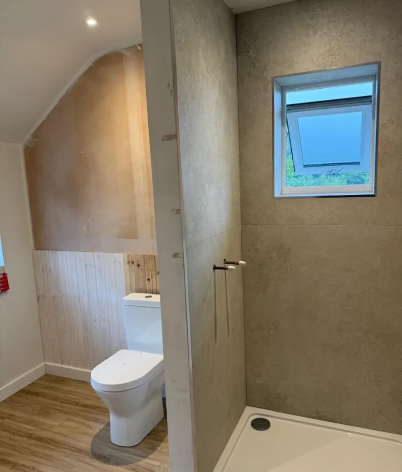 Floral-pattern bathroom with soft pastel tiles and elegant design