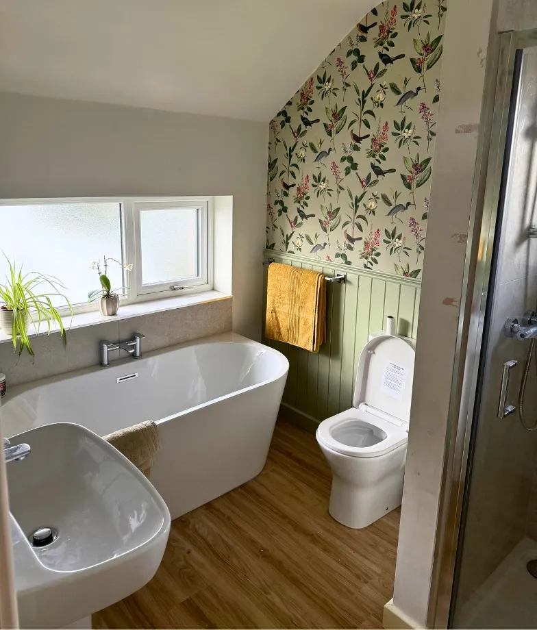 Floral-patterned bathroom with elegant tiles and classic design