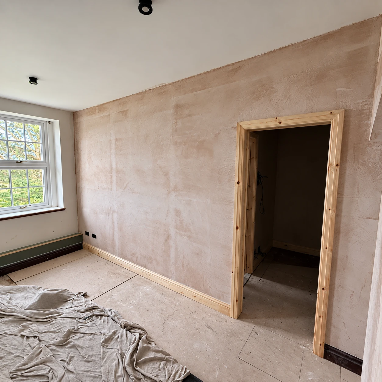 Newly plastered rooms during the master suite refurbishment