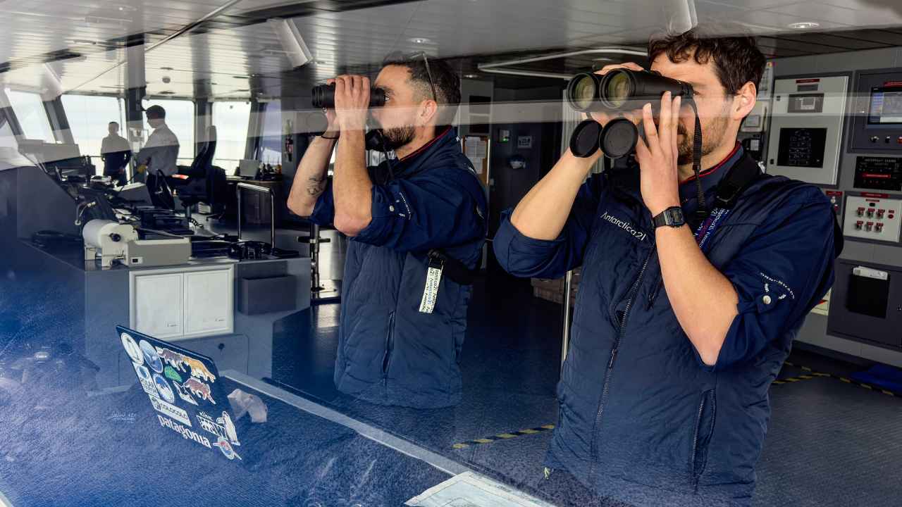 Employees from Antarctica21 using a Leica binocular