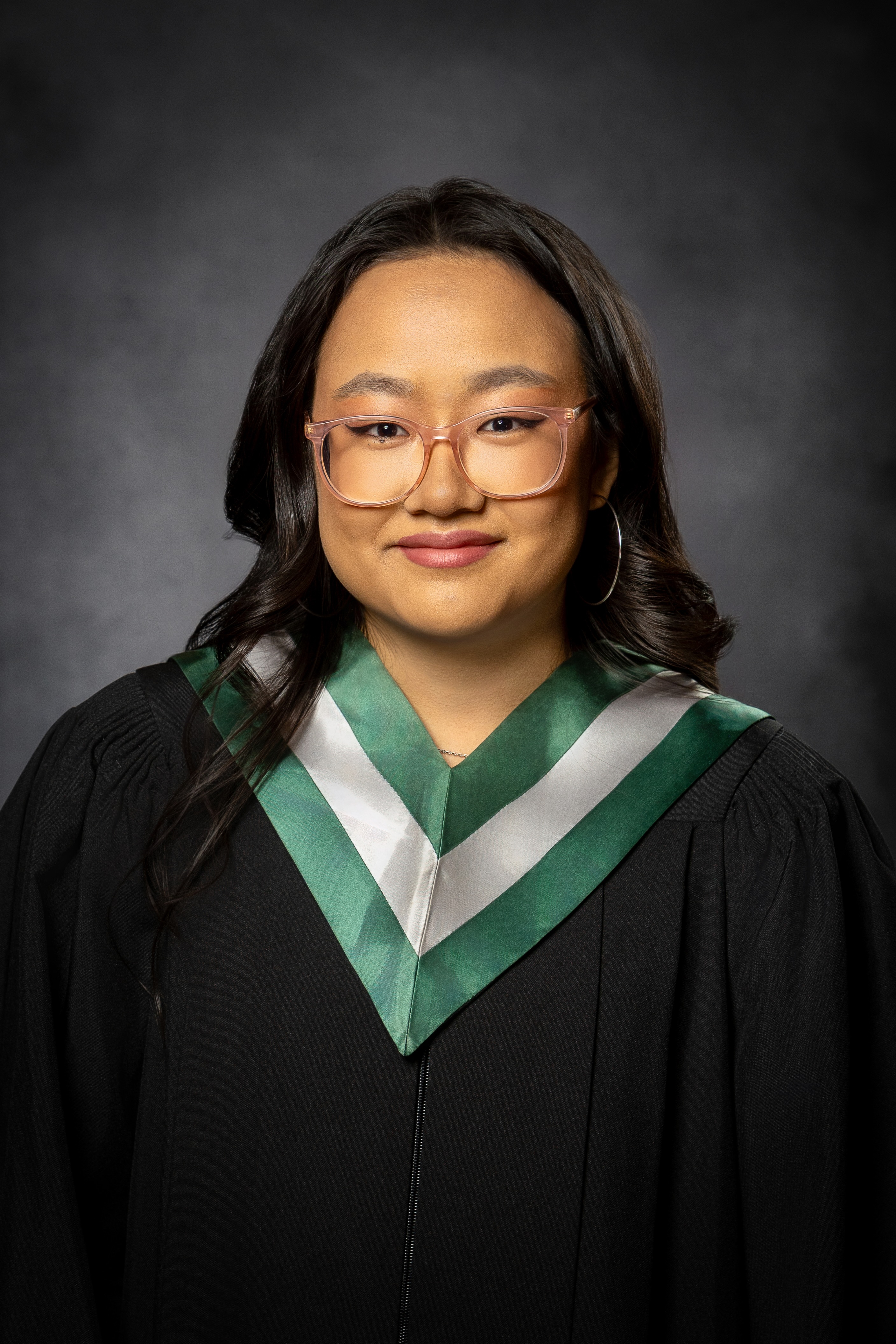 A picture of me (Emily Rest) in a graduation gown