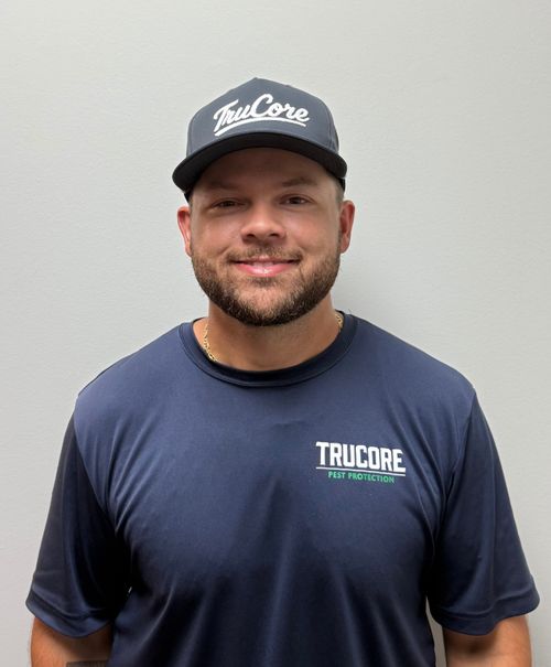 Pest and lawn care photo with Tyler. Sales.