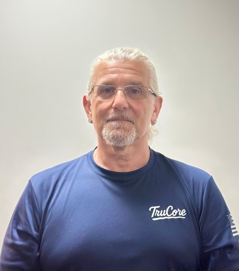 Pest control service headshot with Andre, Office Manager.