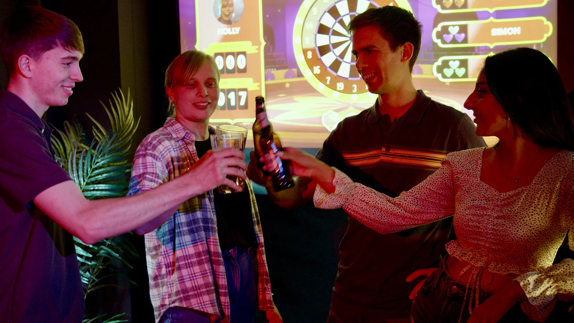 Group celebrating at AR darts