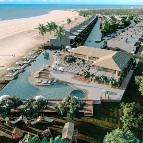 Vue aérienne du site Ibitu Gostoso en bord de mer, illustrant l’implantation stratégique du projet hôtelier imaginé par Momerable.