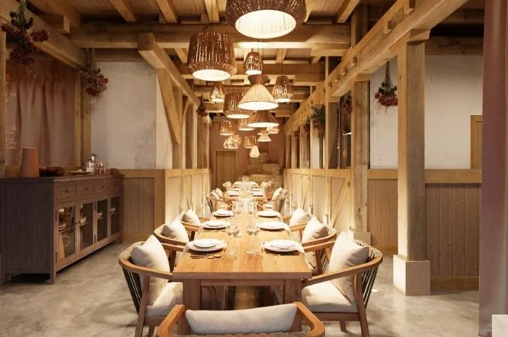 Photo d’une table soigneusement dressée aux Haut-Tierdoz, représentant l’art de recevoir et le raffinement signé Momerable.