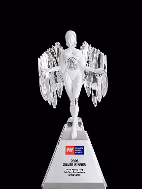 Silver statuette trophy with a winged figure standing on a triangular base labeled 2026 Silver Winner.