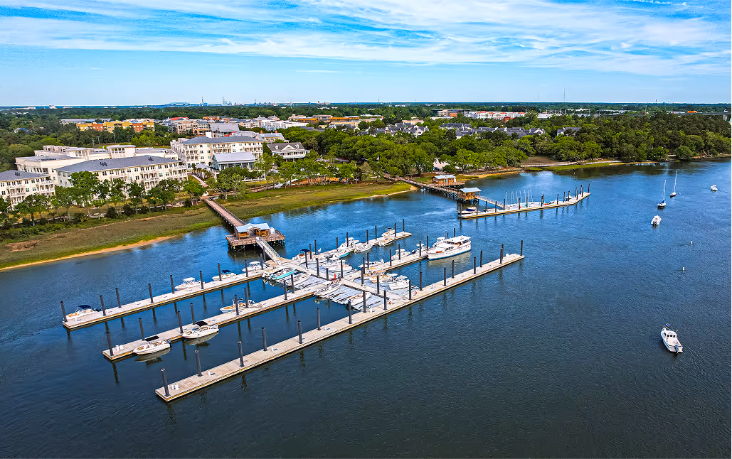 Aerial view of a busy marina on a sunny day