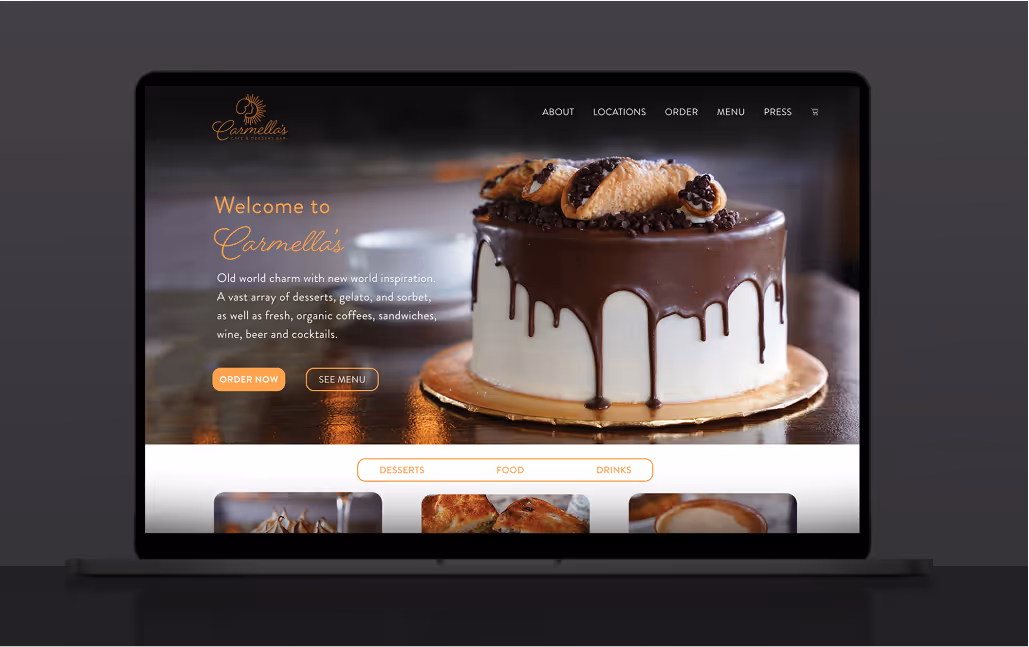 The Carmella's Bakery Homepage displayed on a laptop computer screen