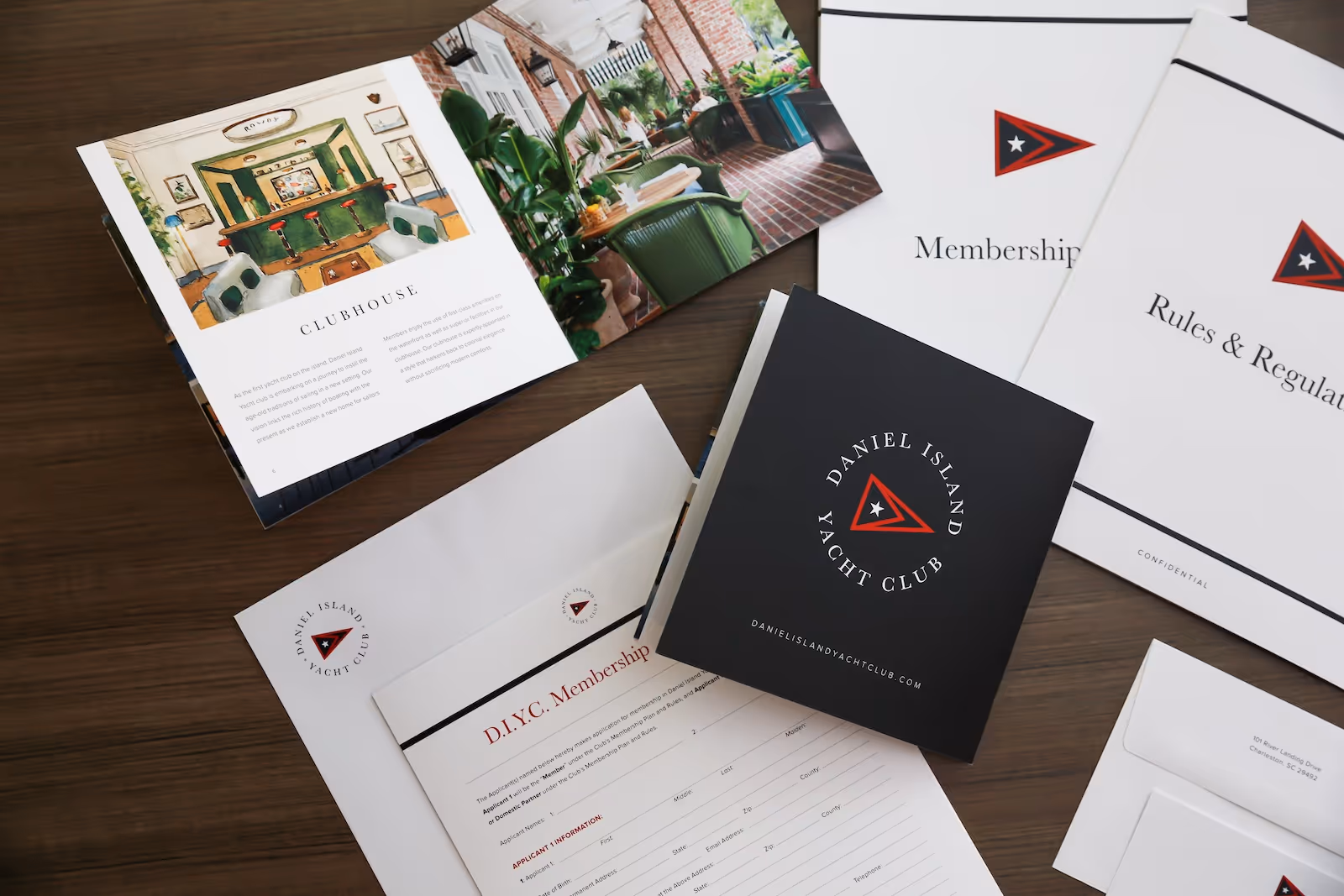 Tabletop view of print collateral for Daniel Island Yacht Club