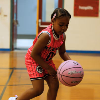 Young Stars girl dribbling
