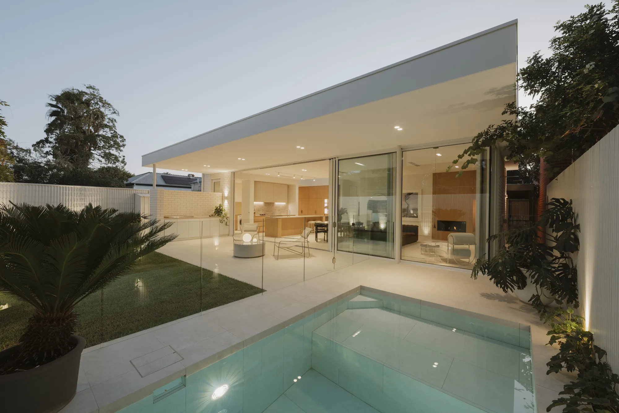 The exterior of a custom new home built in Glenelg Adelaide, showing the pool and outside entertainment area