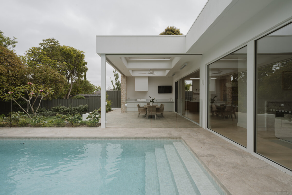 The exterior of a custom new home built in Glenelg Adelaide, showing the pool and outside entertainment area
