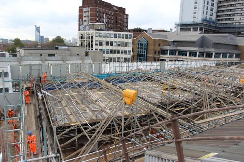Operatives dismantling the station roof.