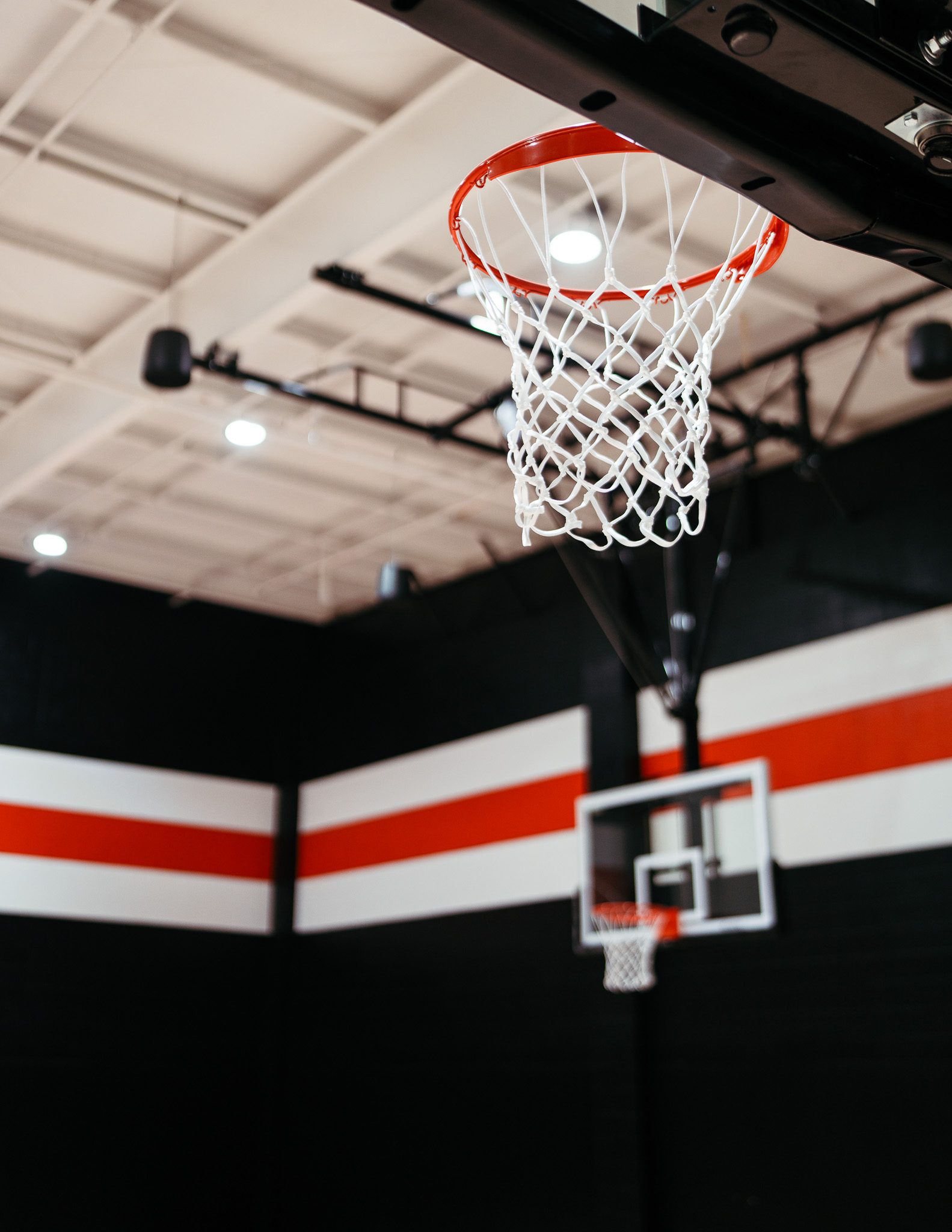 Basketball goal installation at Forge Performance Lab by Modern Ozarks NWA