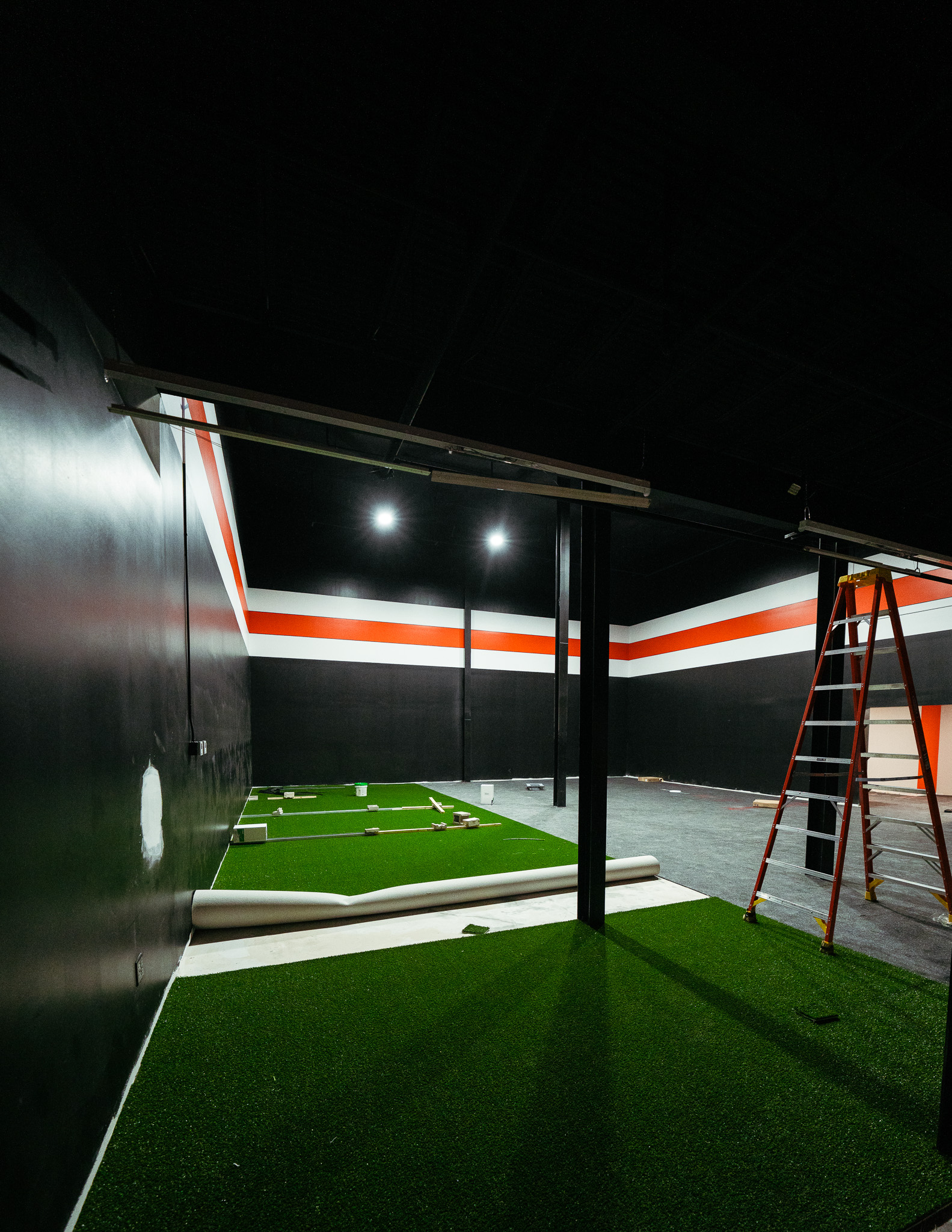Turf flooring installation at Forge Performance Lab by Modern Ozarks NWA