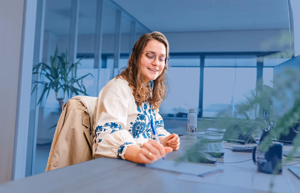 A Nobel employee notes down information on paper