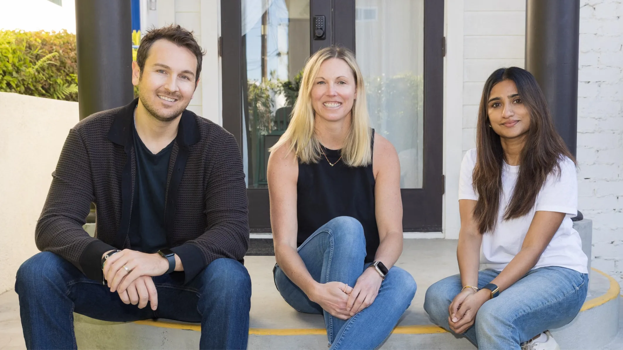 The Inscope founders sitting together outside their office