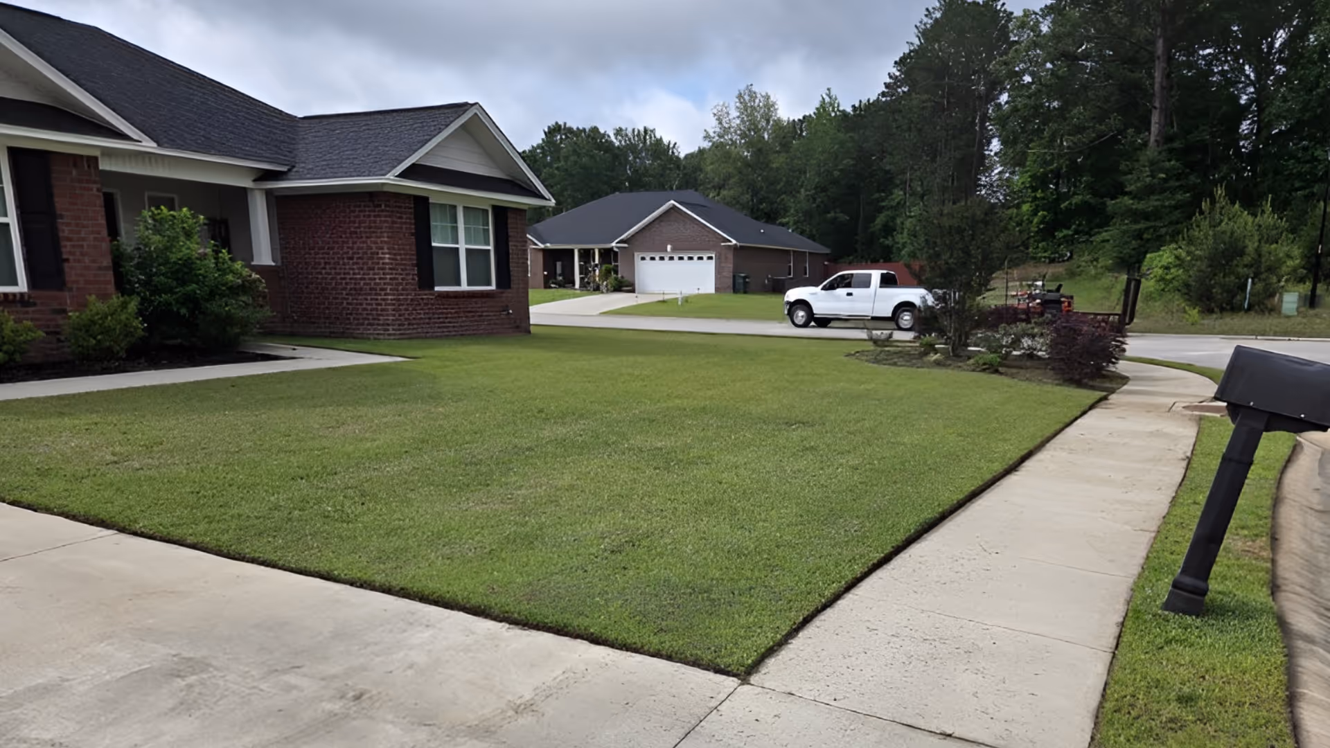 before and after edging by ATC Lawn Care in Sumter, SC
