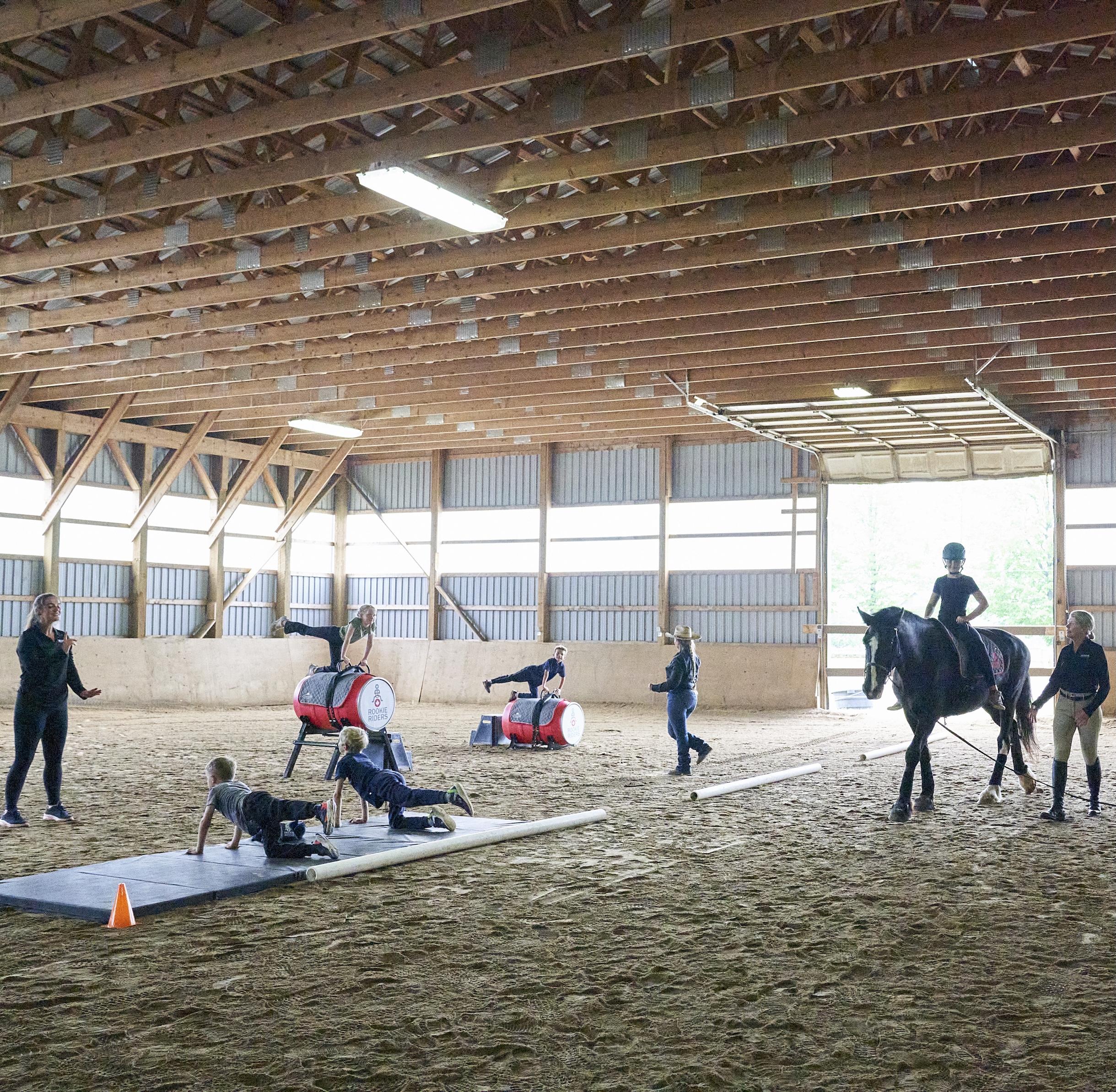 happy child during horse riding lesson
