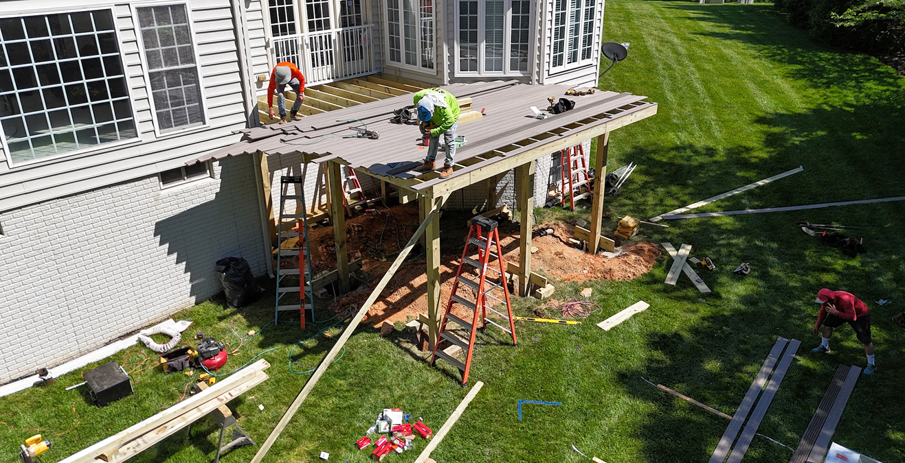 Upgryd deck construction in Bethlehem, PA, featuring Trex Rocky Harbor decking, providing a stylish and durable solution for outdoor living spaces.