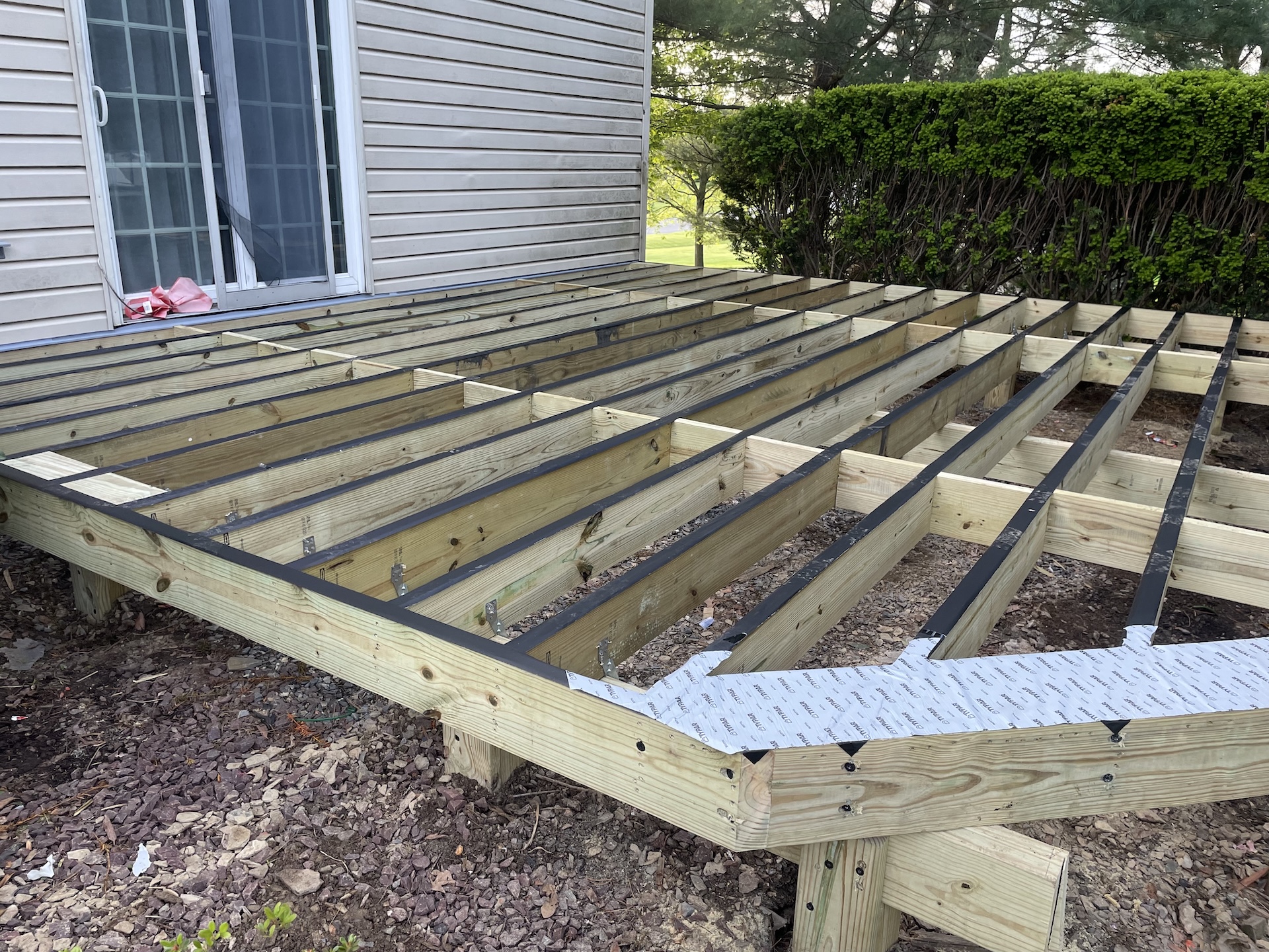 Pressure-treated framing and joists for new deck