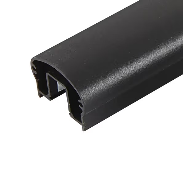 Black curved top rail cover with an open underside and internal support channels