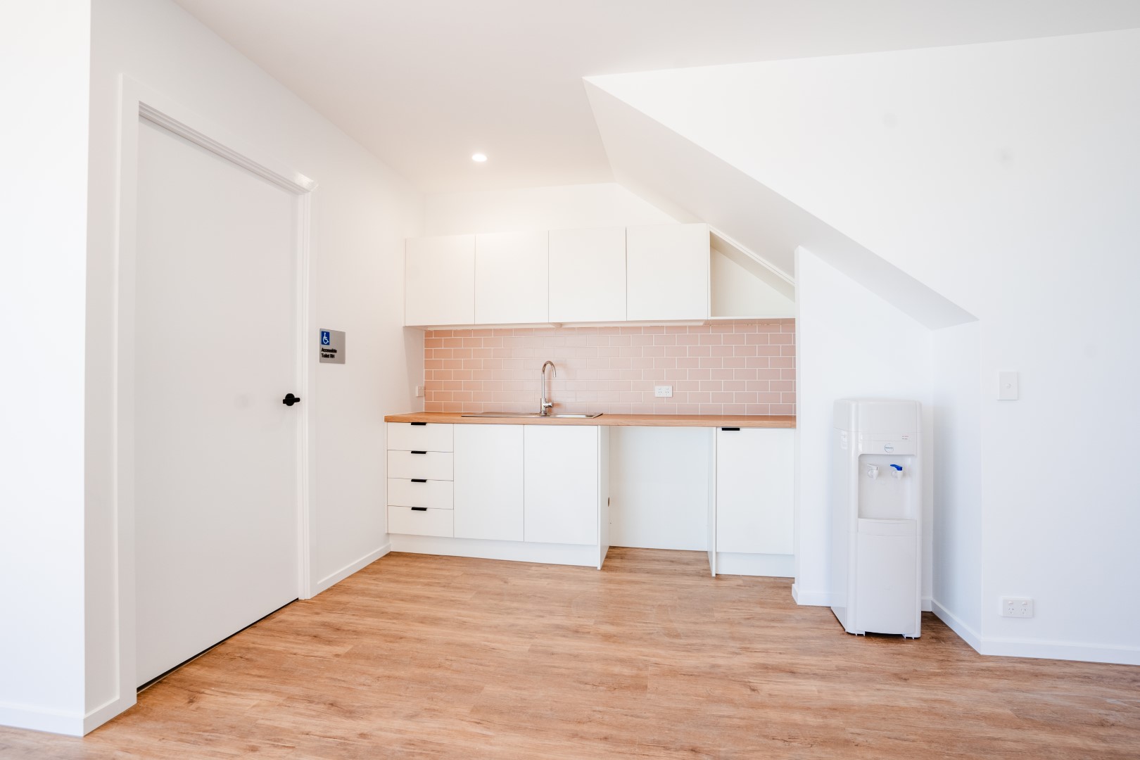 Addictive Pole Kitchenette – Custom Joinery Solution