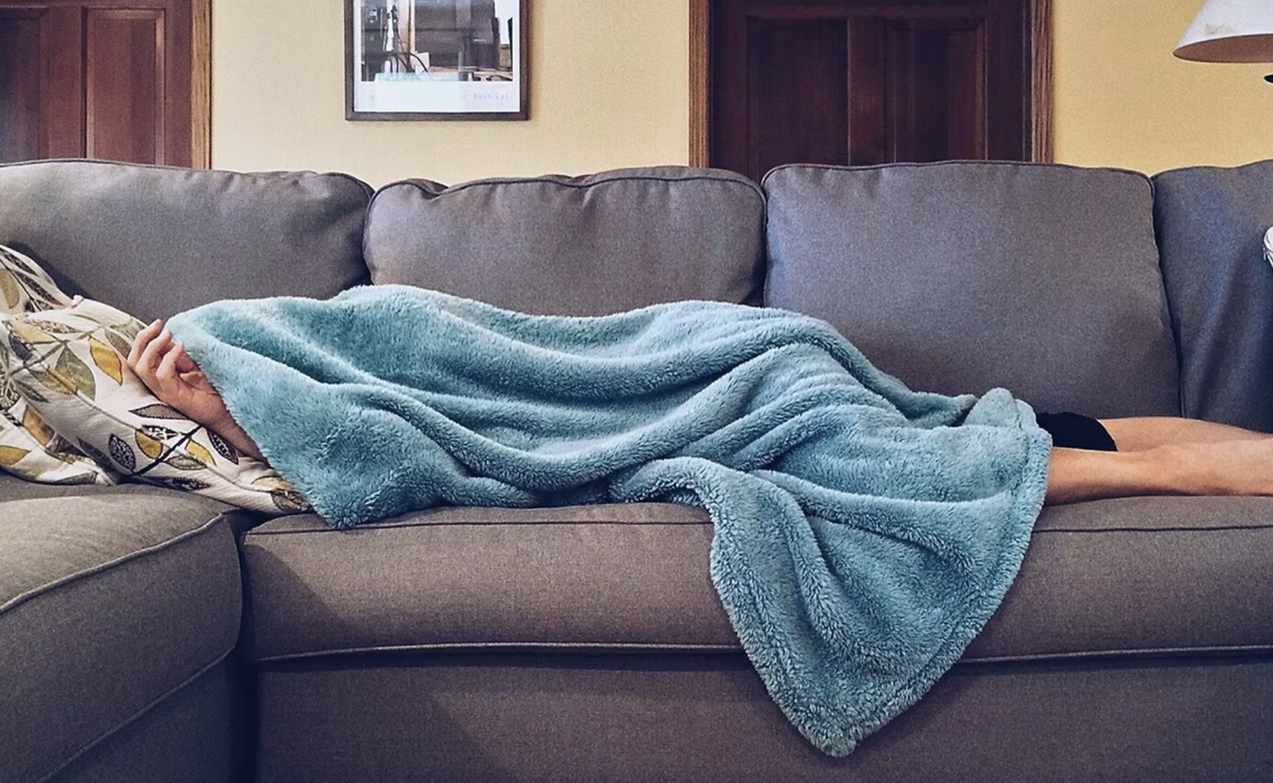 Black and white stylized image of a person's head with brain illustrations