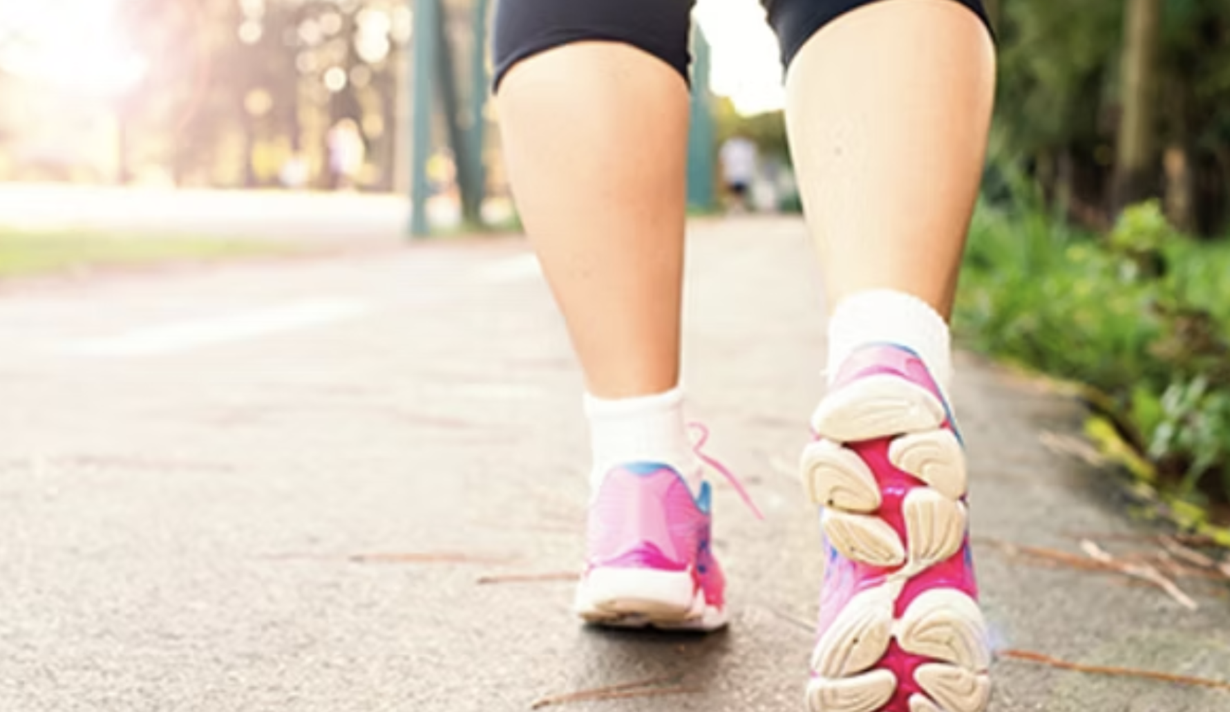 Black and white stylized image of a person's head with brain illustrations